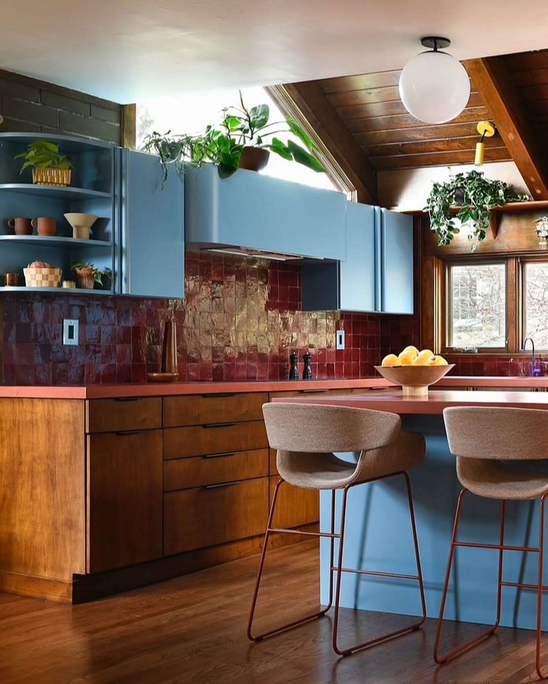 Blue Cabinetry Tops Offer Plant Perches