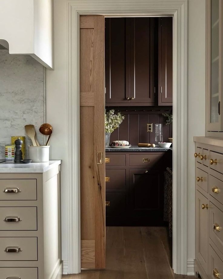 Sliding Barn Door Conceals a Deep Kitchen Pantry