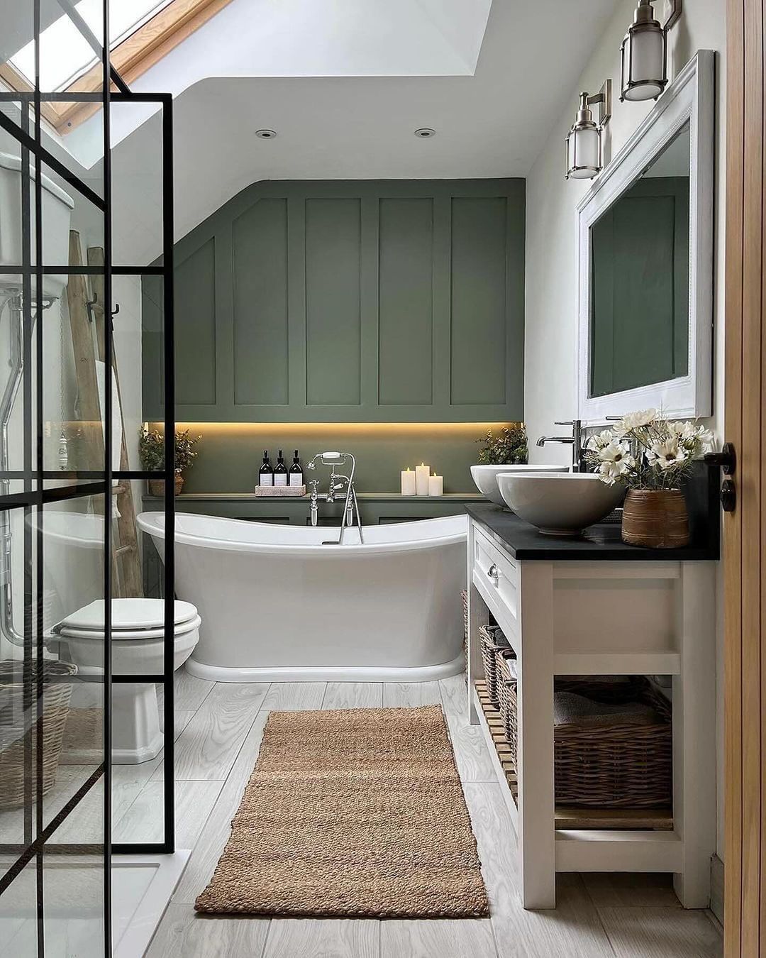 Green Wainscoting Adds a Backdrop of Color Behind the Tub