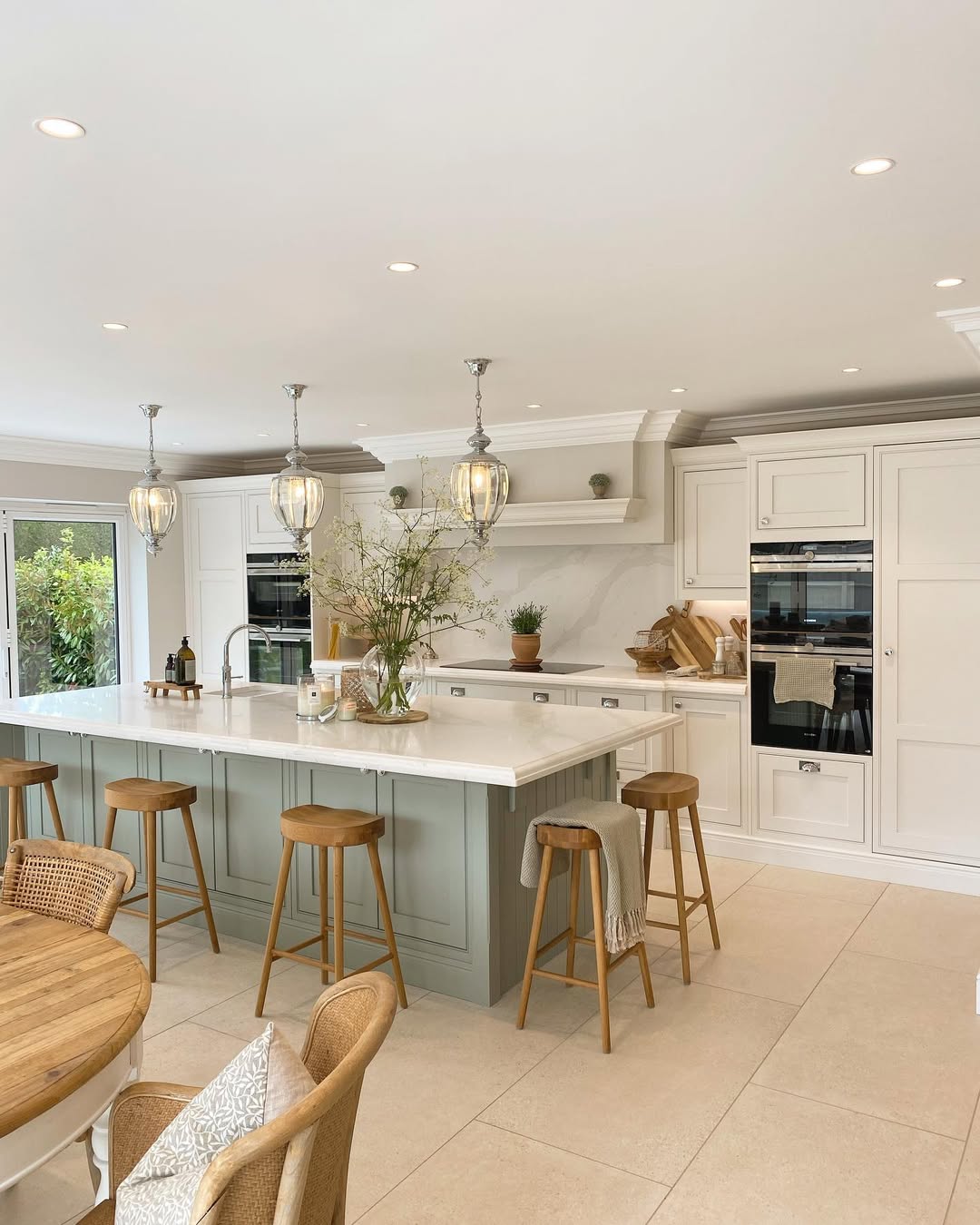 Tall Glass Vase With Airy Greenery Adds Softness to Kitchen Island