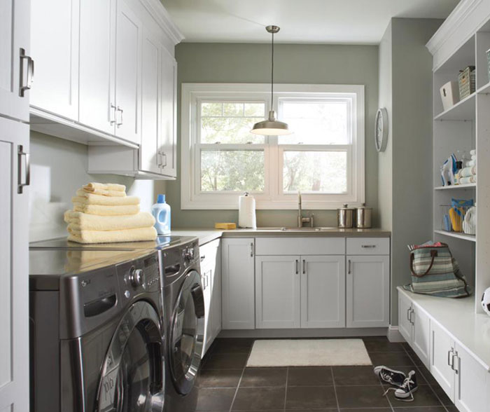 White Built-in Cabinets and Drawers Offer Concealed Storage