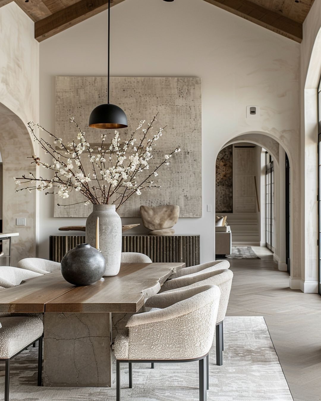 Textured Bouclé Chairs Soften a Live-Edge Table