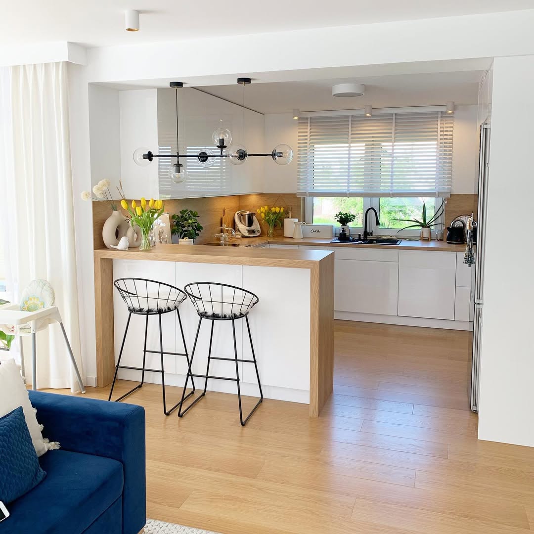 Choose Wire Bar Stools for an Airy Feel at the Island