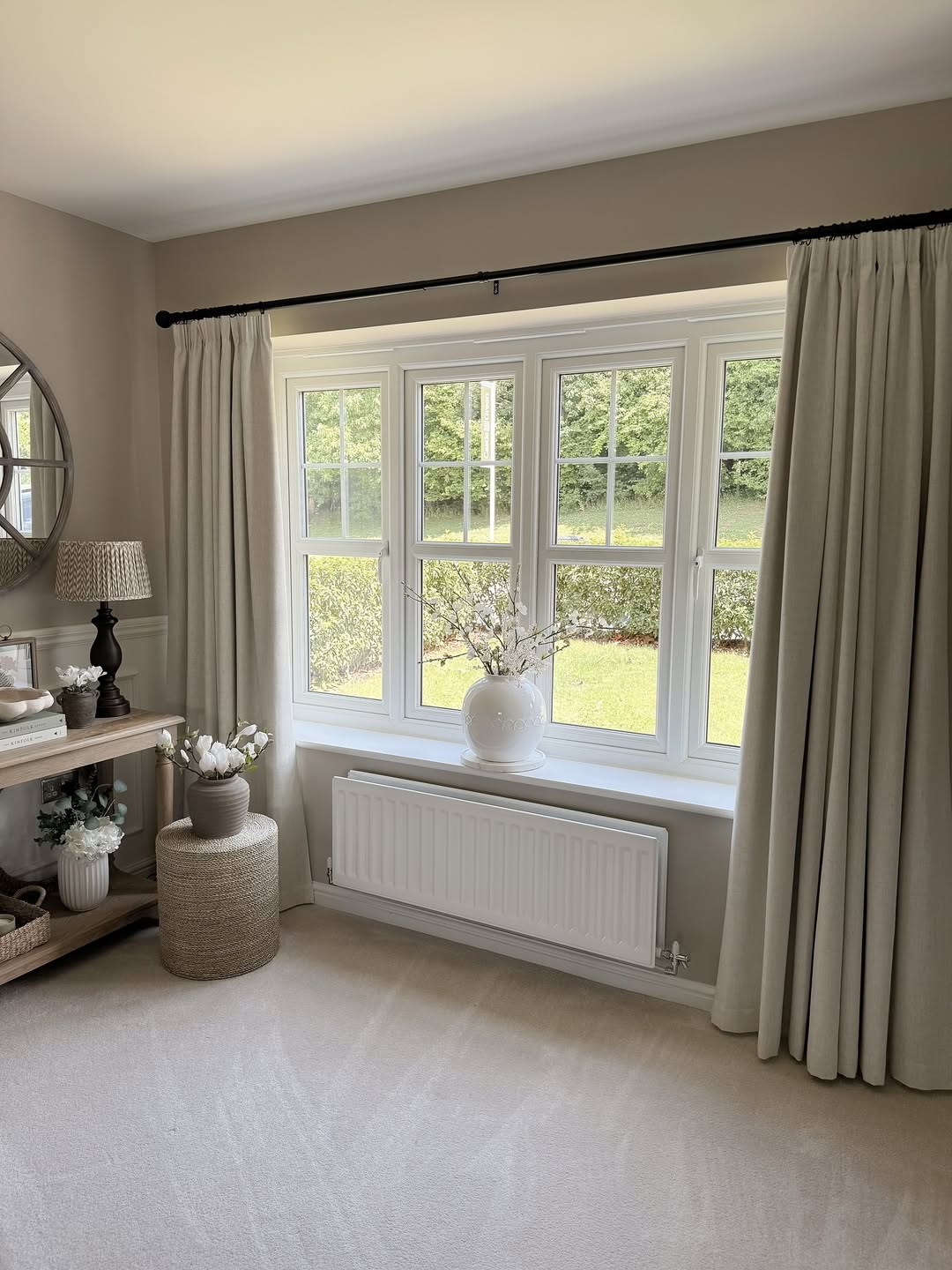 Neutral Linen Curtains Frame a Garden View