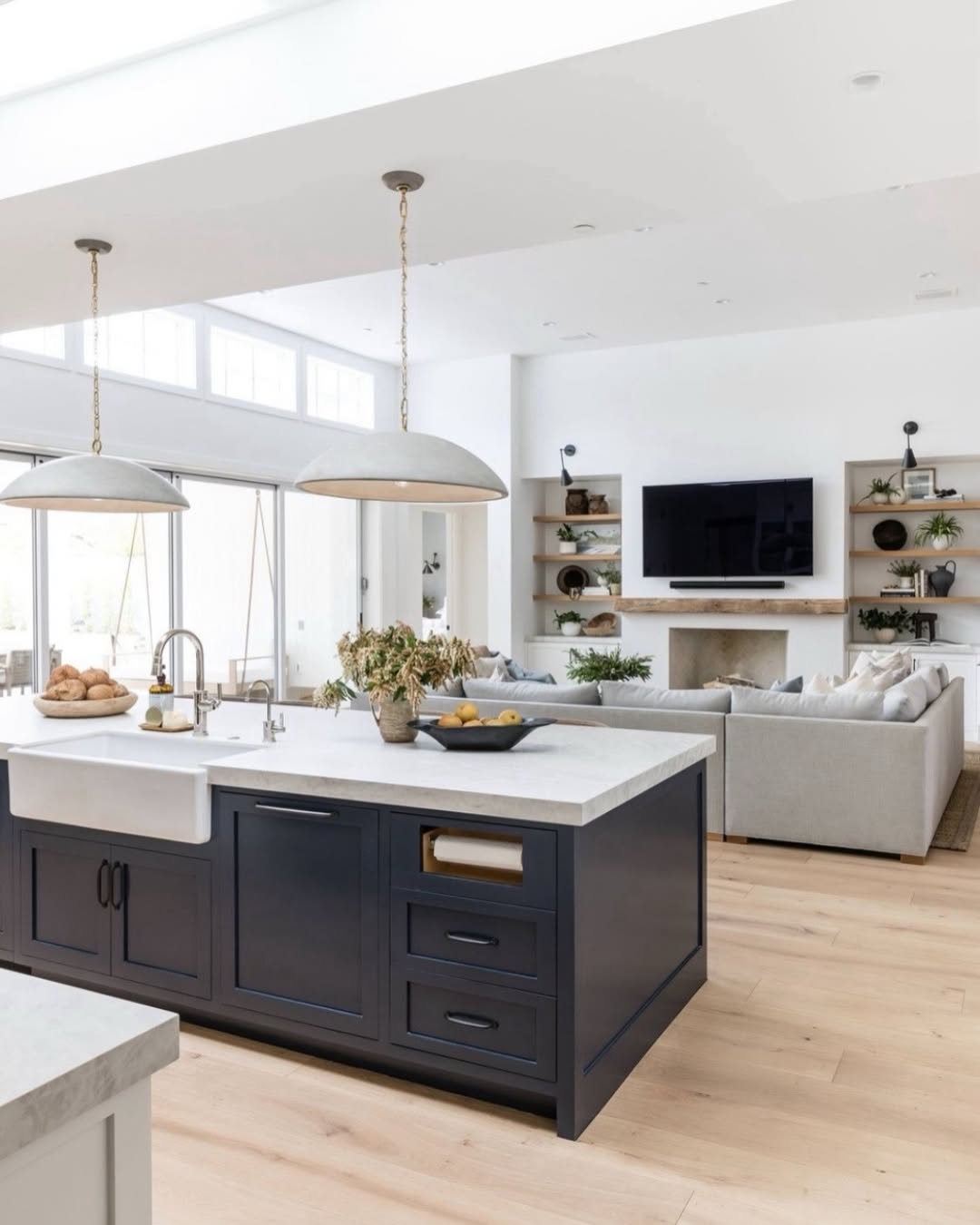 Integrate a Paper Towel Holder into Dark Blue Island Cabinets