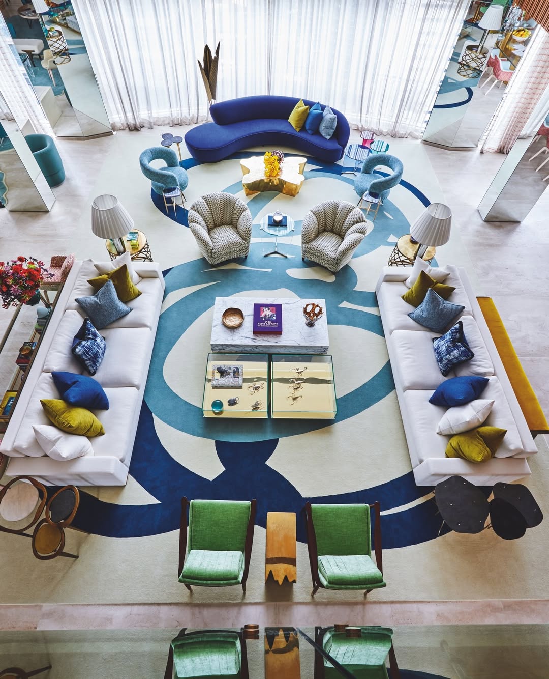 Two-Tiered Coffee Table With Glass Top Displays Artwork