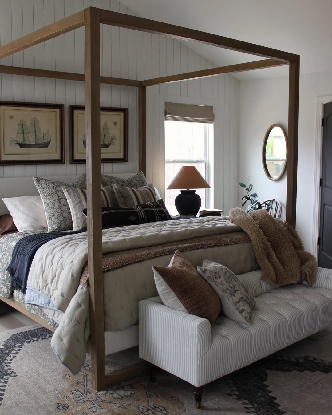 Striped Bench Adds Cozy Seating at the Foot of the Bed