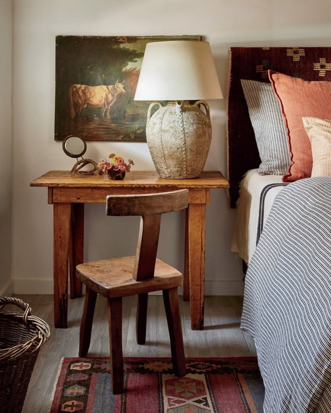 Textured Amphora Lamp Adds Rustic Charm to Bedside Table