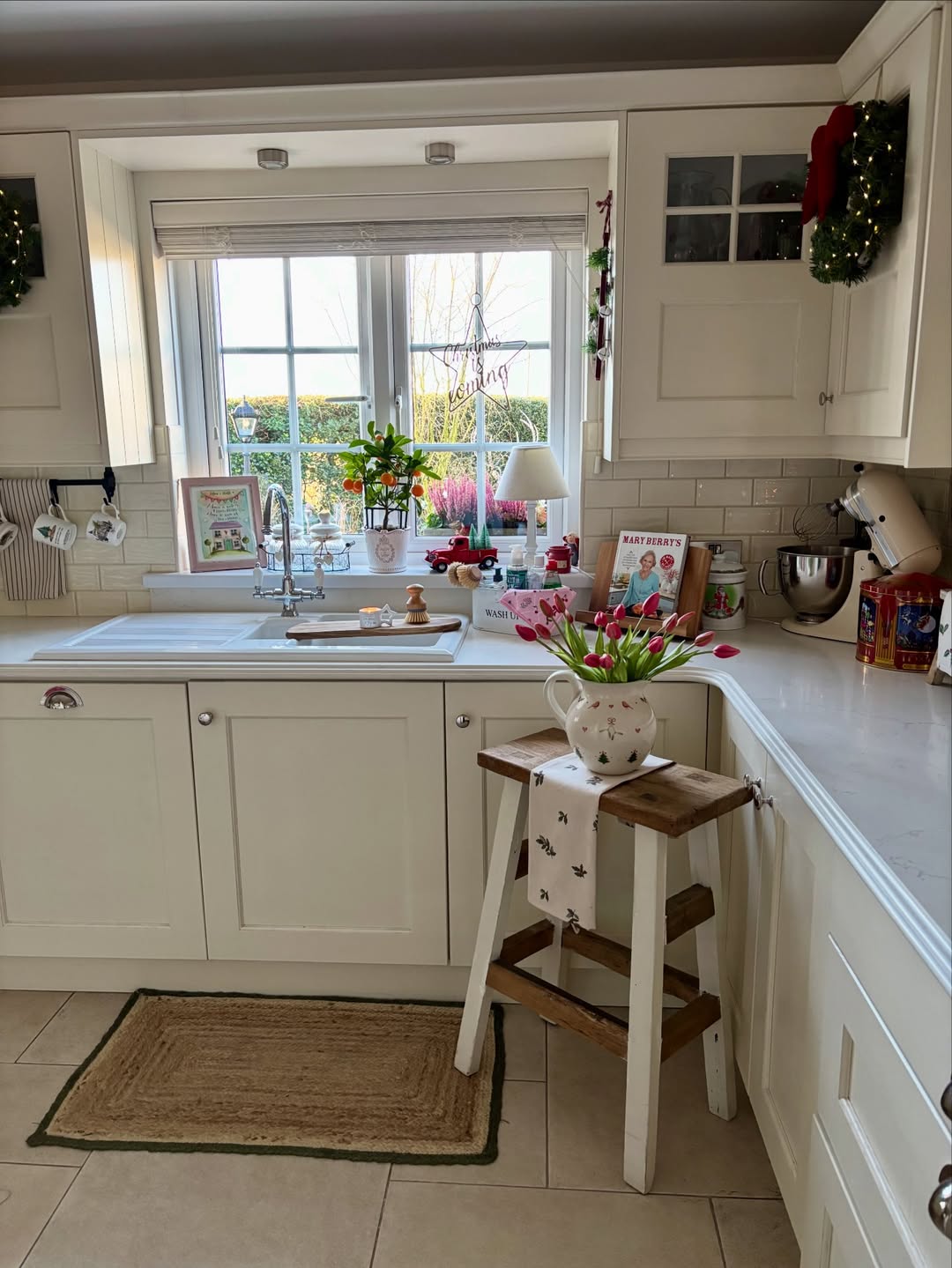 Wooden Step Stool Adds Decorative Height Beside the Counter