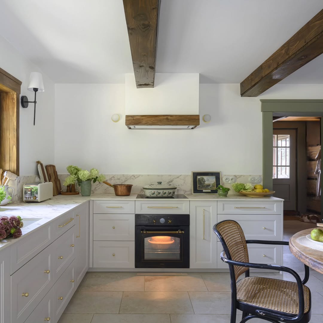 Wood Beam Range Hood Adds Rustic Texture Above Stove