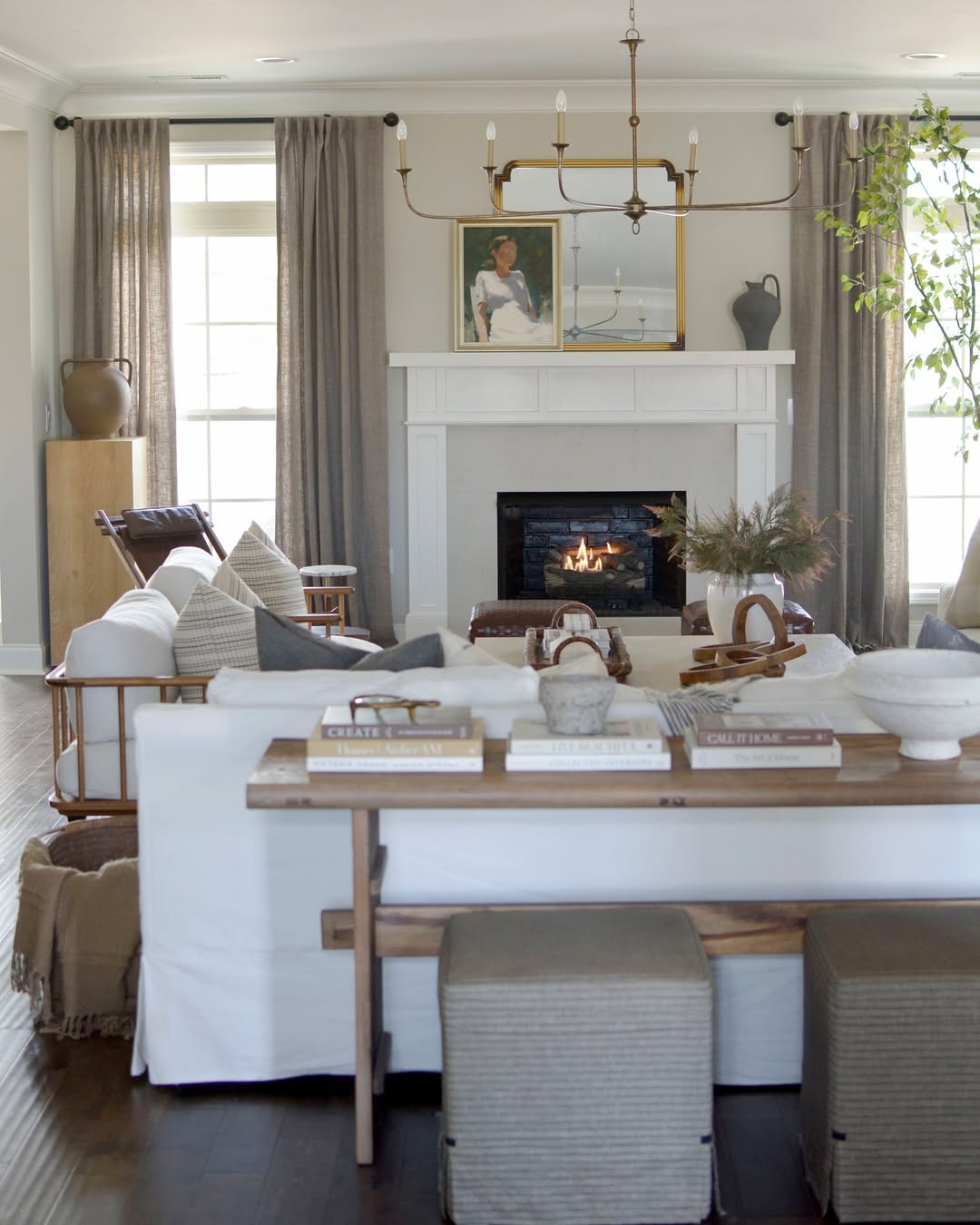 Console Table Styling with Stacked Books and Decorative Objects