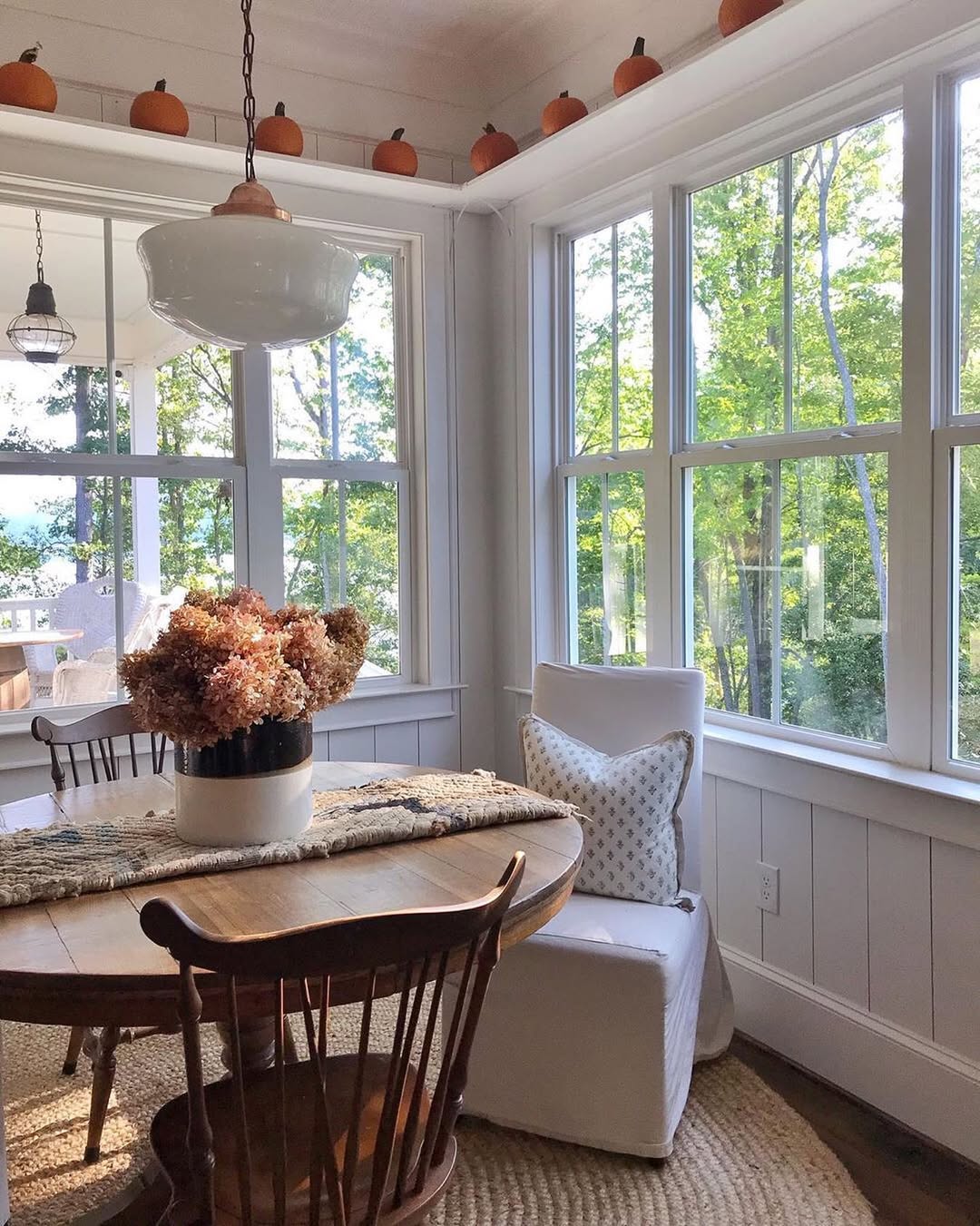 Mini Pumpkins Line Upper Ledges for Fall Decor