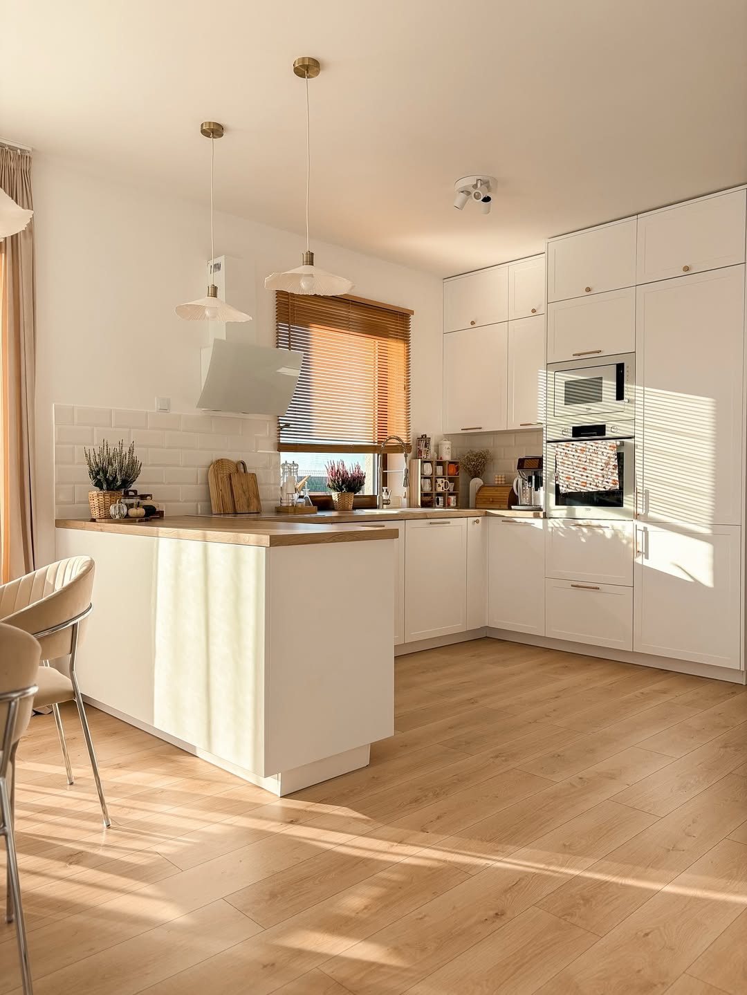 Contrast White Cabinets with a Warm Wood Island Countertop