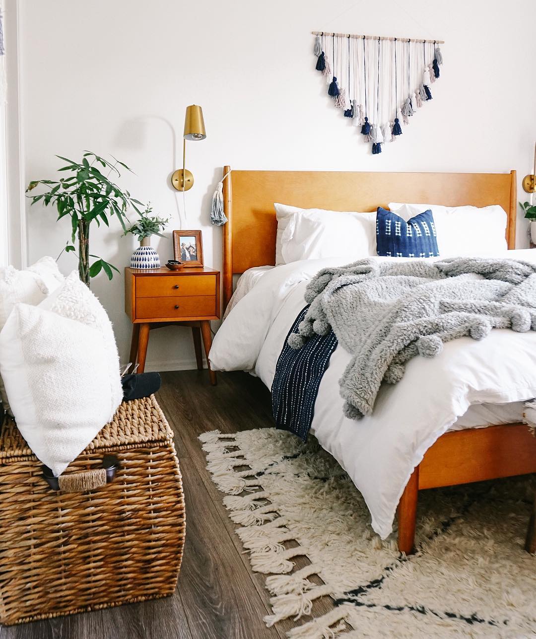 Combine a Wood Headboard with Tassel Wall Art