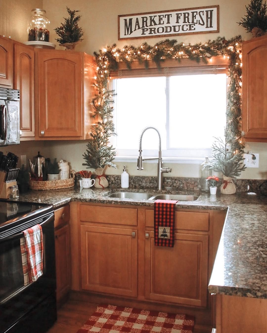 Garland and Lights Frame Kitchen Window