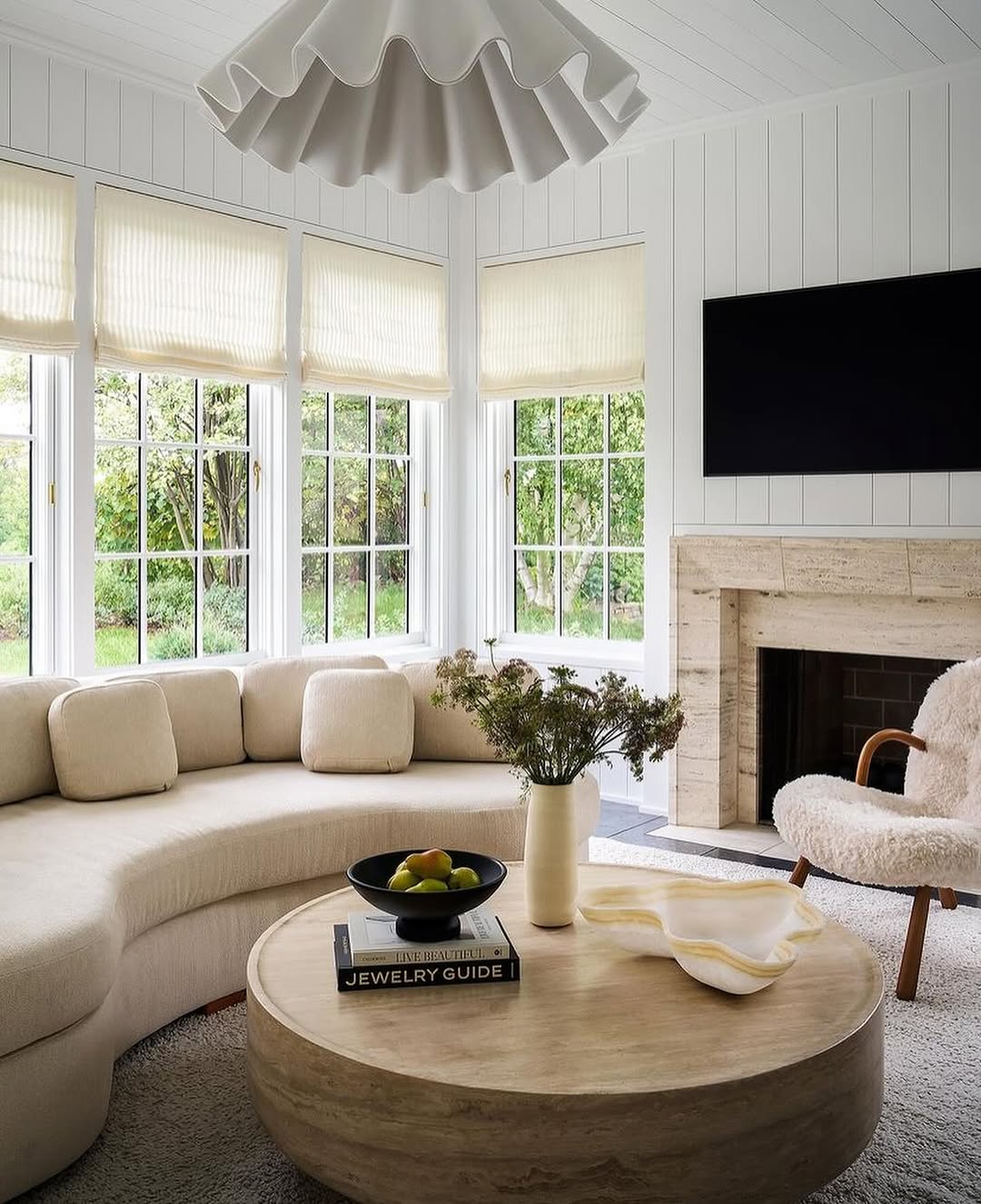 Fluted Pendant Light Adds Softness Above Seating