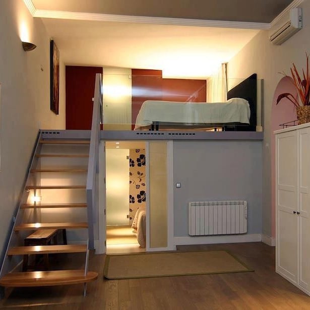 Loft Bed with Glass Railing for Open Airiness
