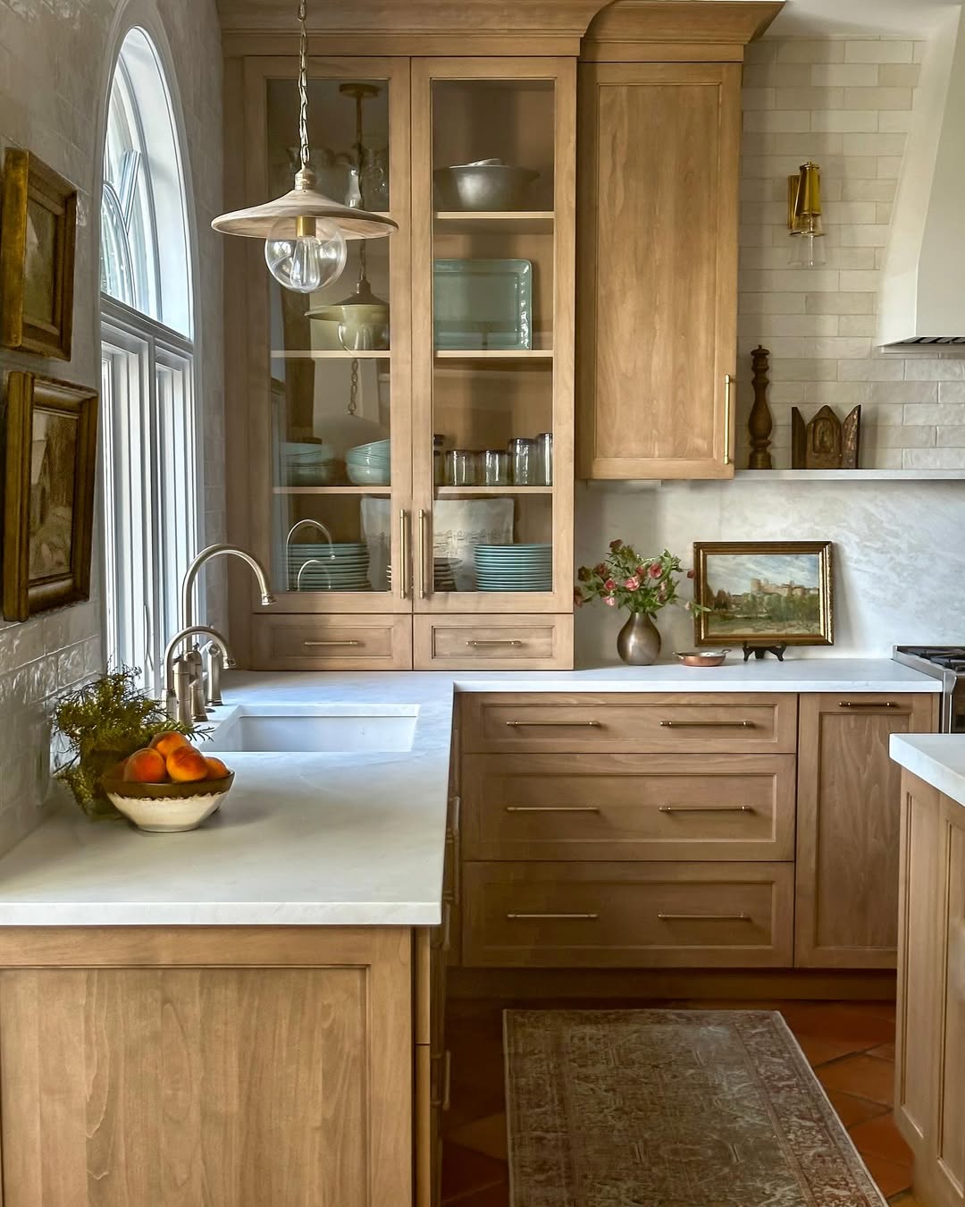 Glass-Front Cabinets Displaying Stacked Plates and Bowls