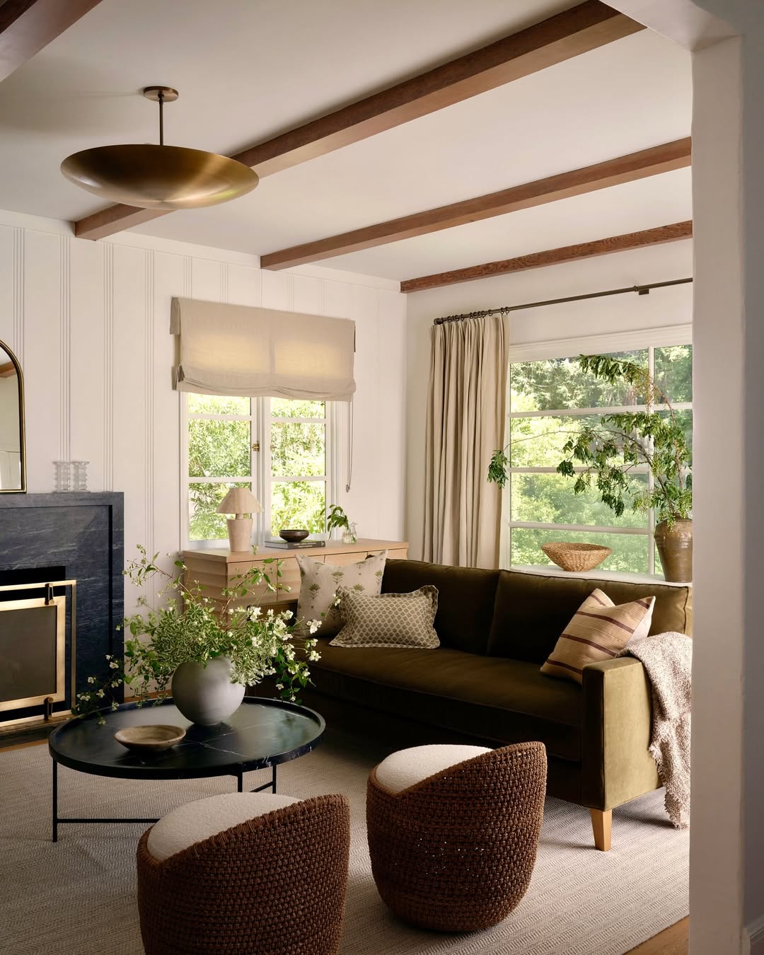 Layer Decor on a Dark Round Coffee Table