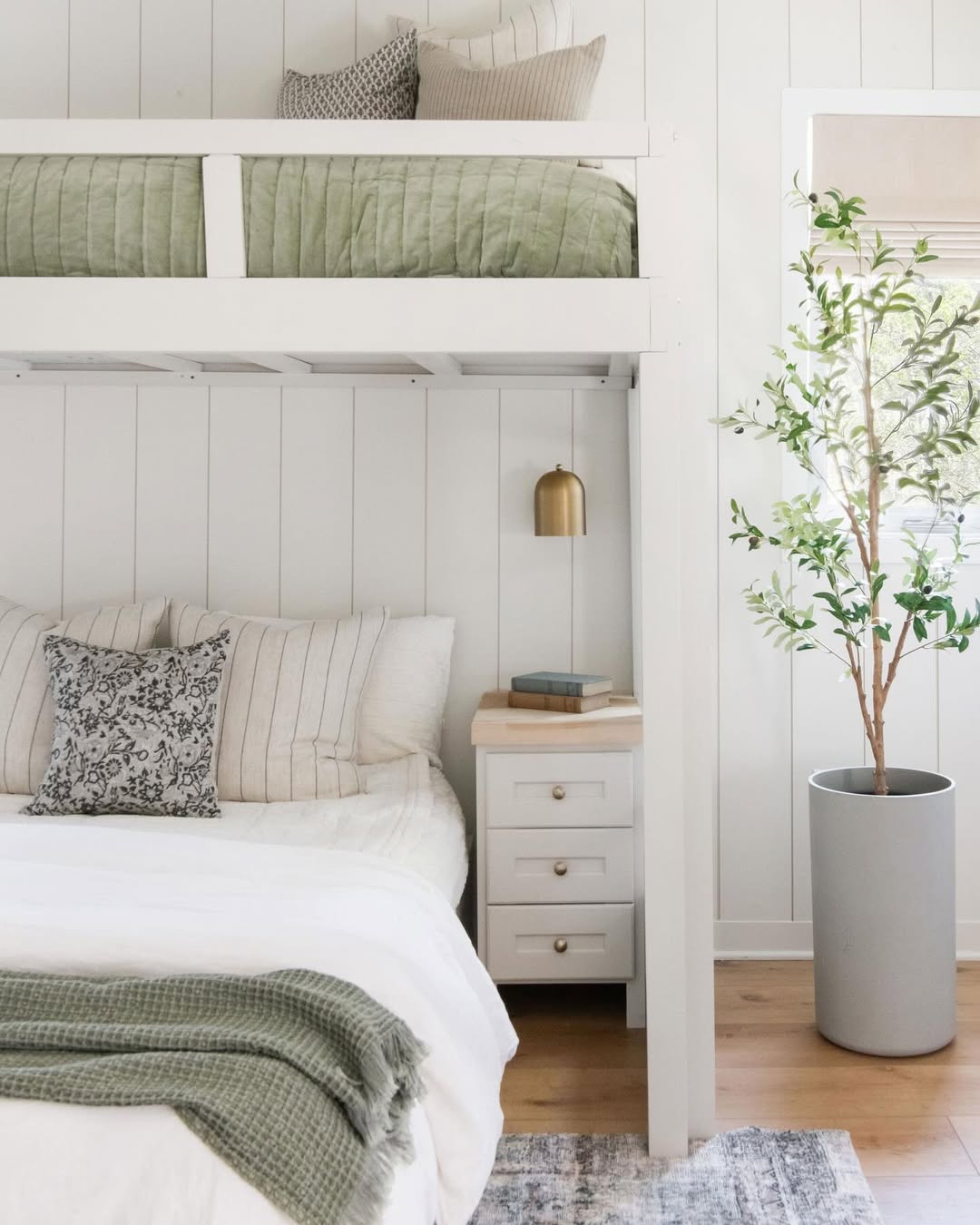 Brass Bell Light Adds Warm Ambiance to Bunk Bed Nook