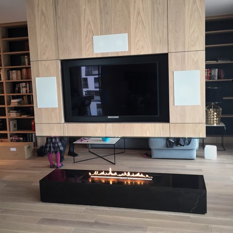 Wood Paneling Creates a Built-In TV Look