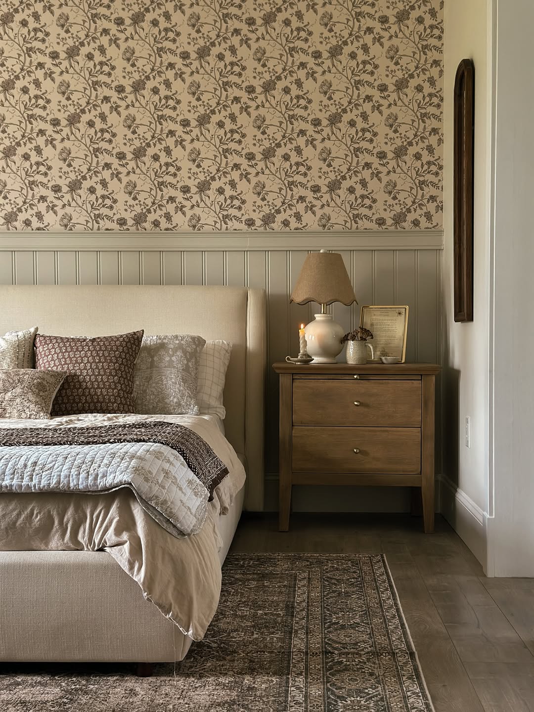 Keep Bedside Essentials Organized on a Wood Nightstand With Brass Knobs