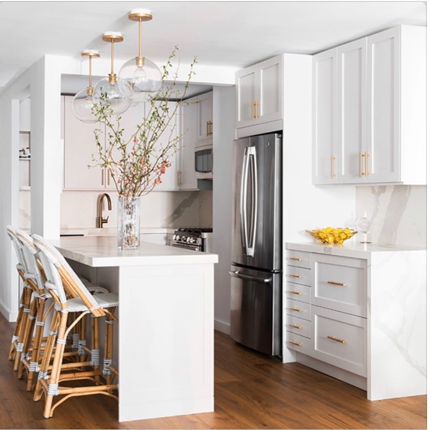 Glass Globe Pendants Add Airy Light Over Island