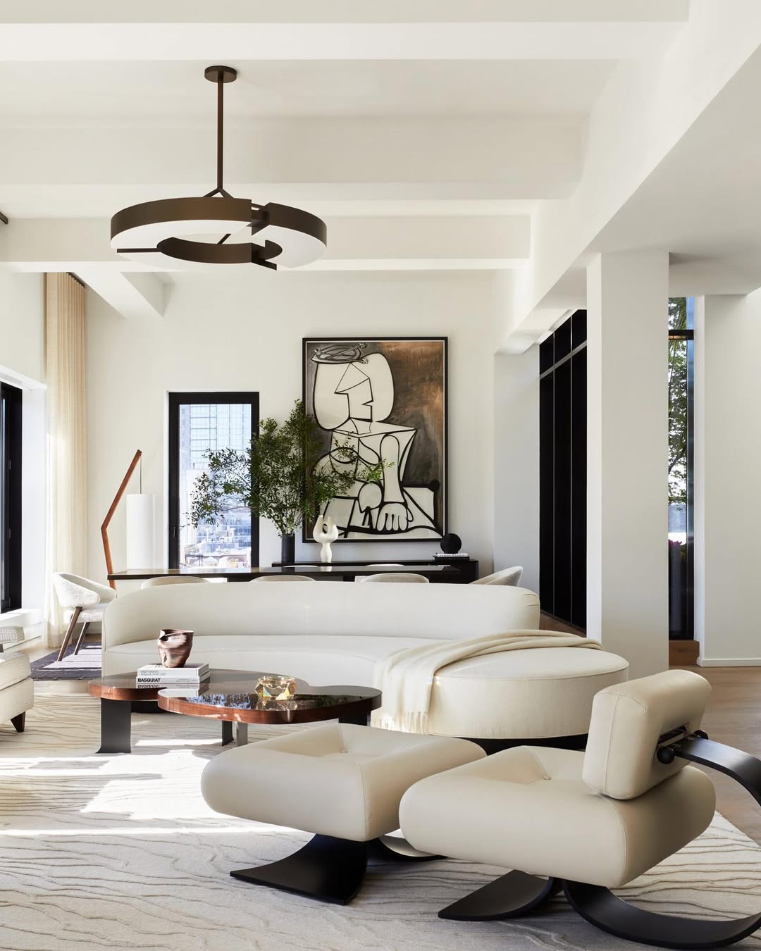 Sculptural Chandelier With Open Rings Adds Modern Art