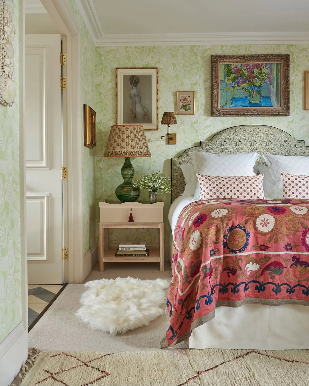 Layered Artwork Adds Personality Above the Bed