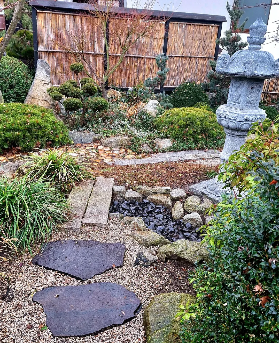 Irregular Stone Slabs Create a Natural Path Over Gravel