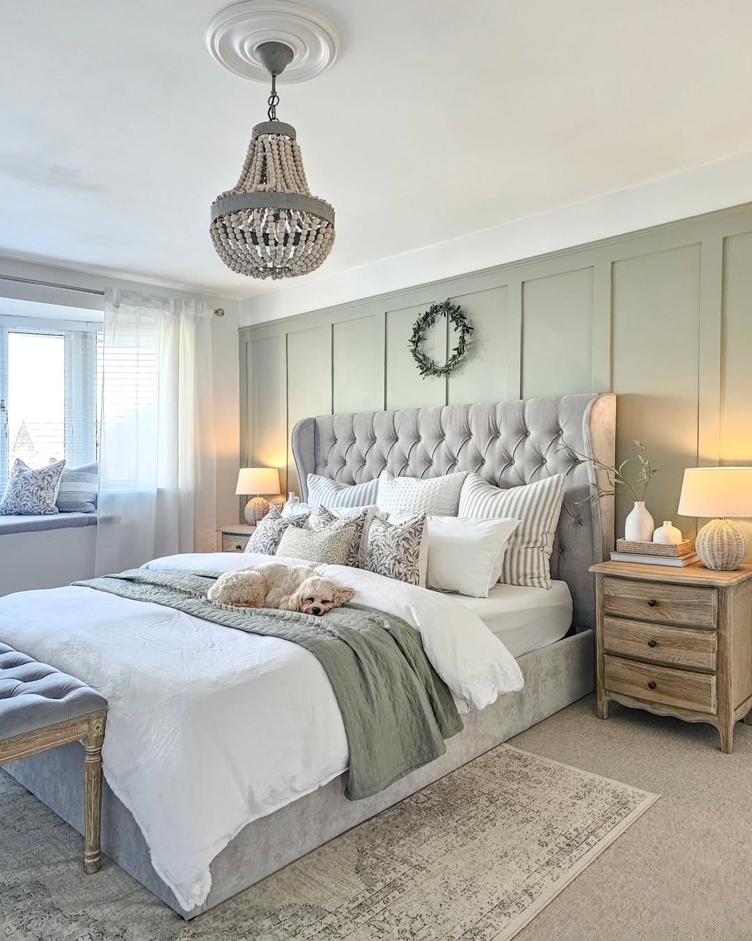 Beaded Chandelier Adds Rustic Charm Above the Bed