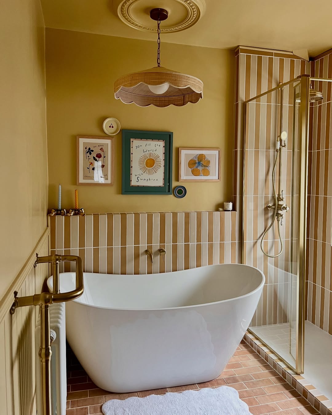 Gallery Wall Adds Personality Above Freestanding Tub