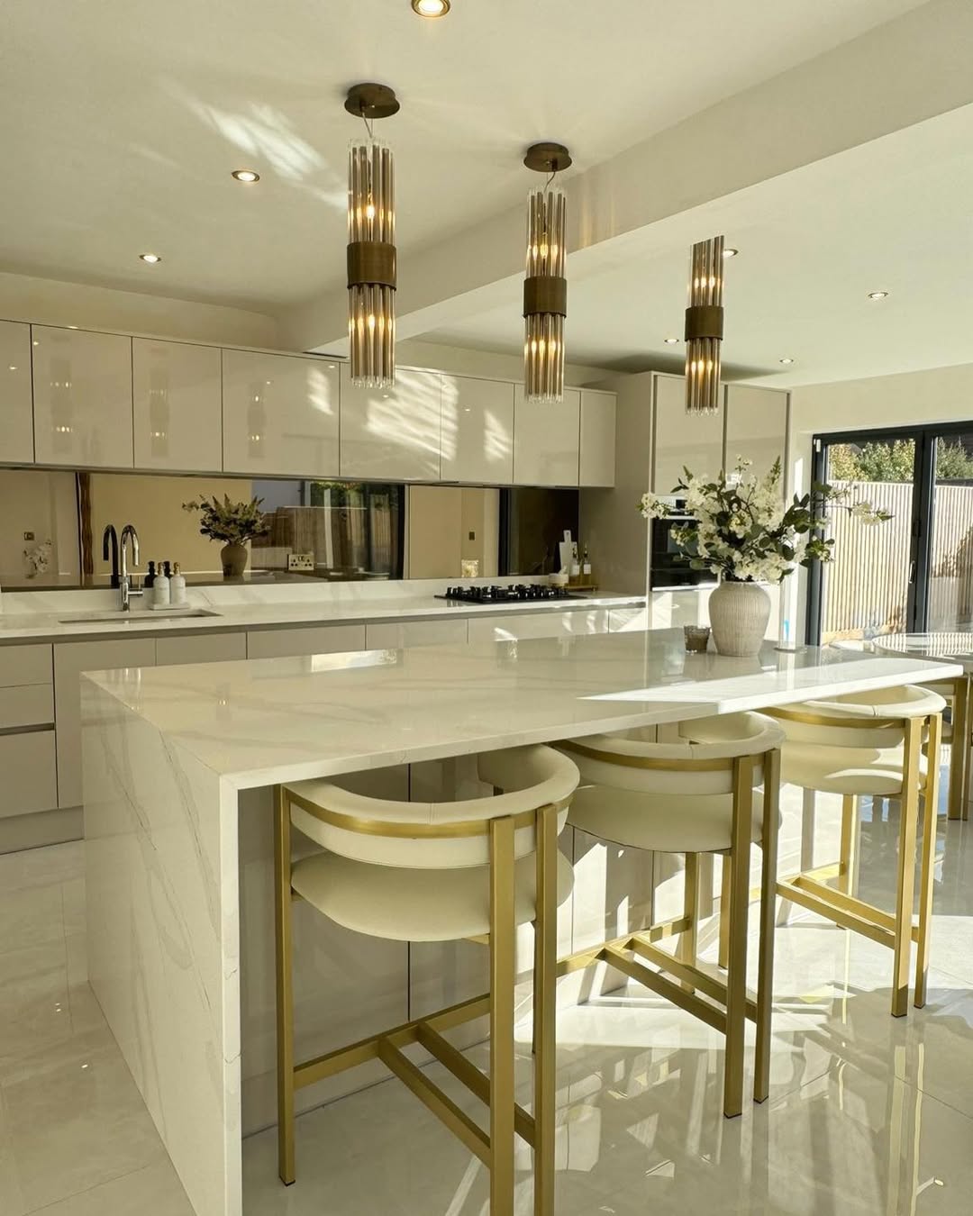 Gold-Legged Bar Stools Add Glamour to Island Seating