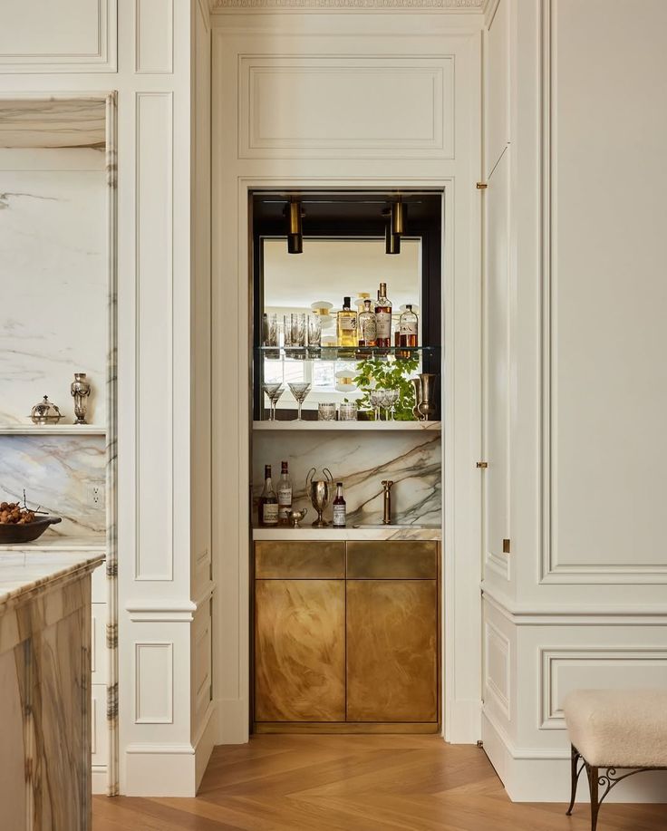 Brass Cabinet Bar Adds Glamour Behind a Hidden Door