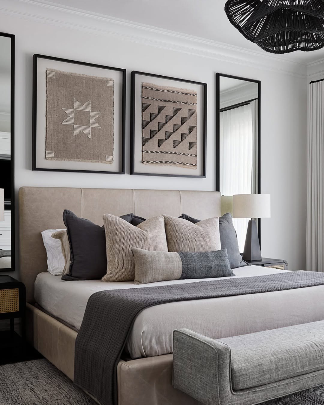 Framed Textiles Add Layered Texture Above the Bed