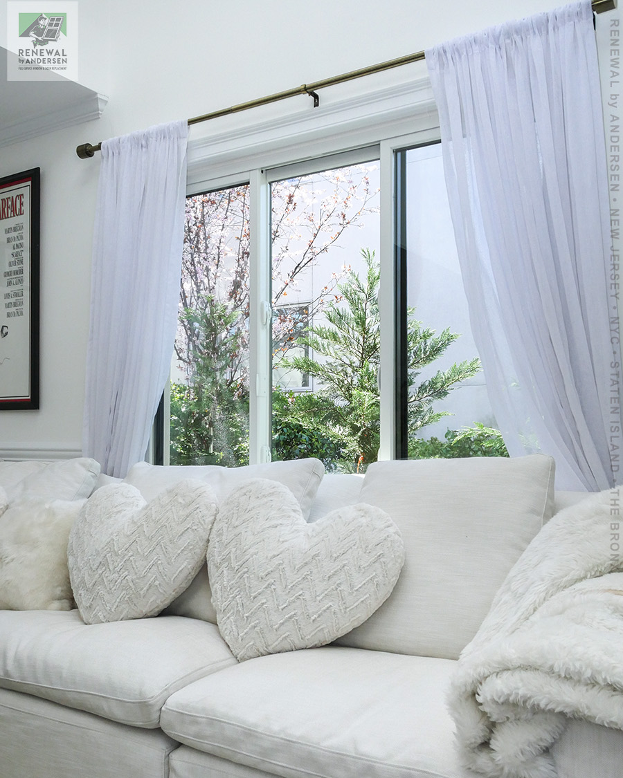 Sheer White Curtains Soften Large Window Views