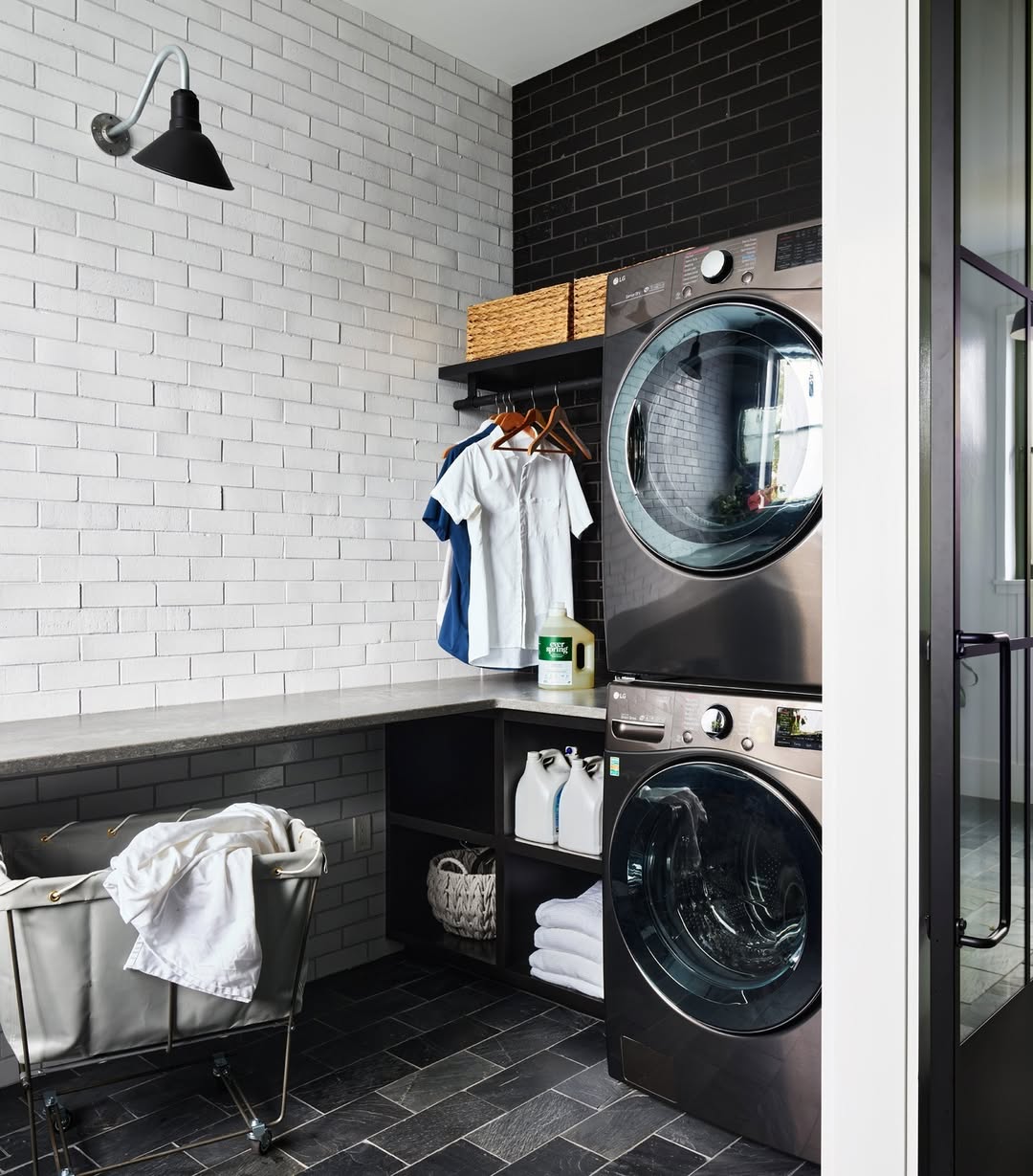 Black Brick Wall Backs Stacked Washer and Dryer