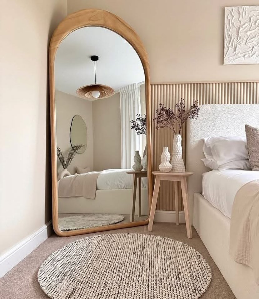 Arched Floor Mirror Adds Natural Wood Frame to Room