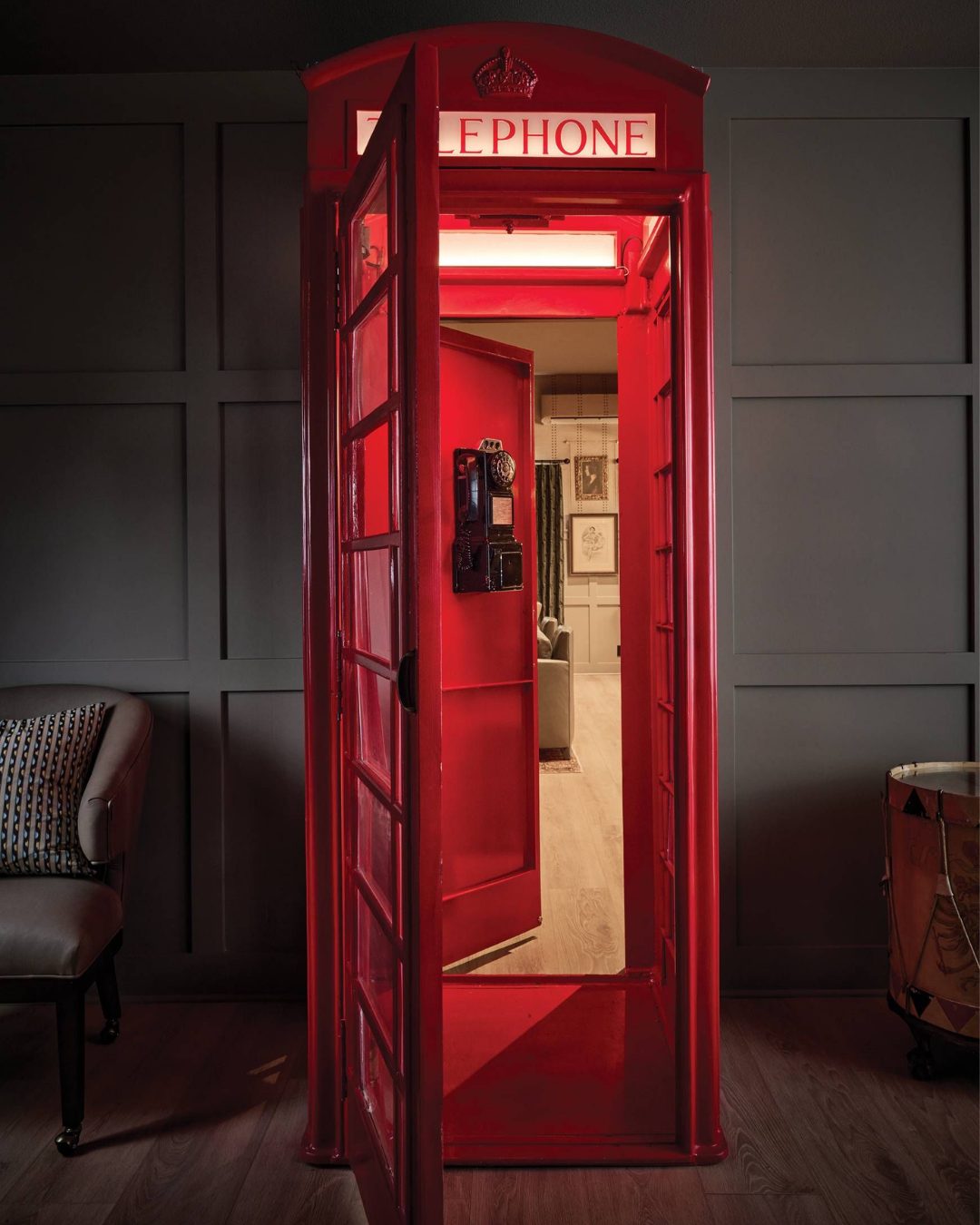 Red Telephone Booth Creates a Whimsical Hidden Doorway