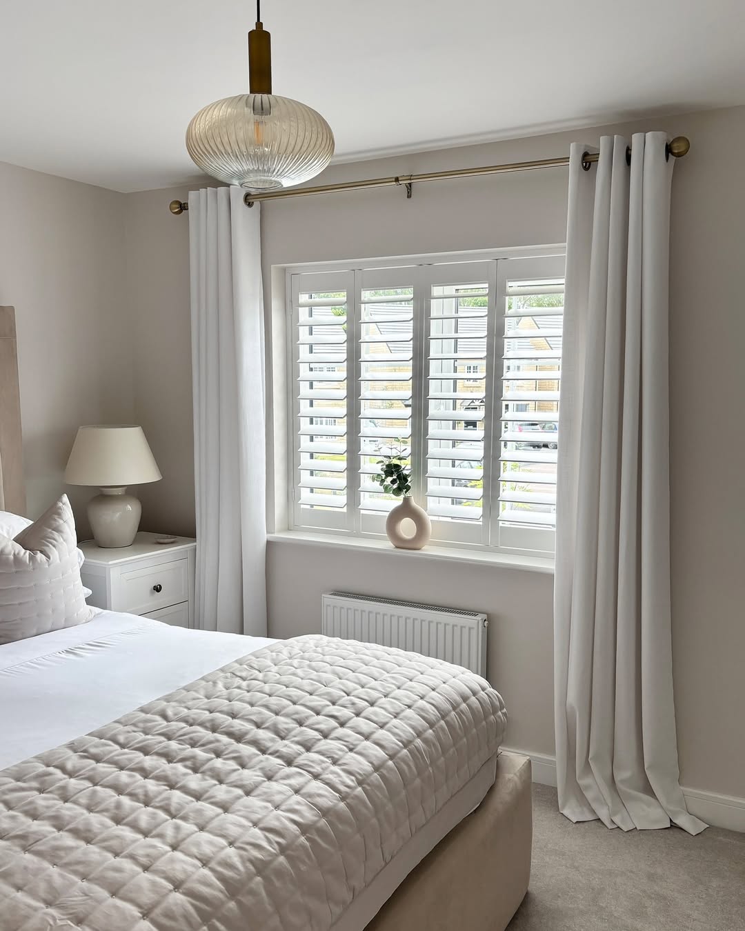 Soften Sunlight with White Plantation Shutters