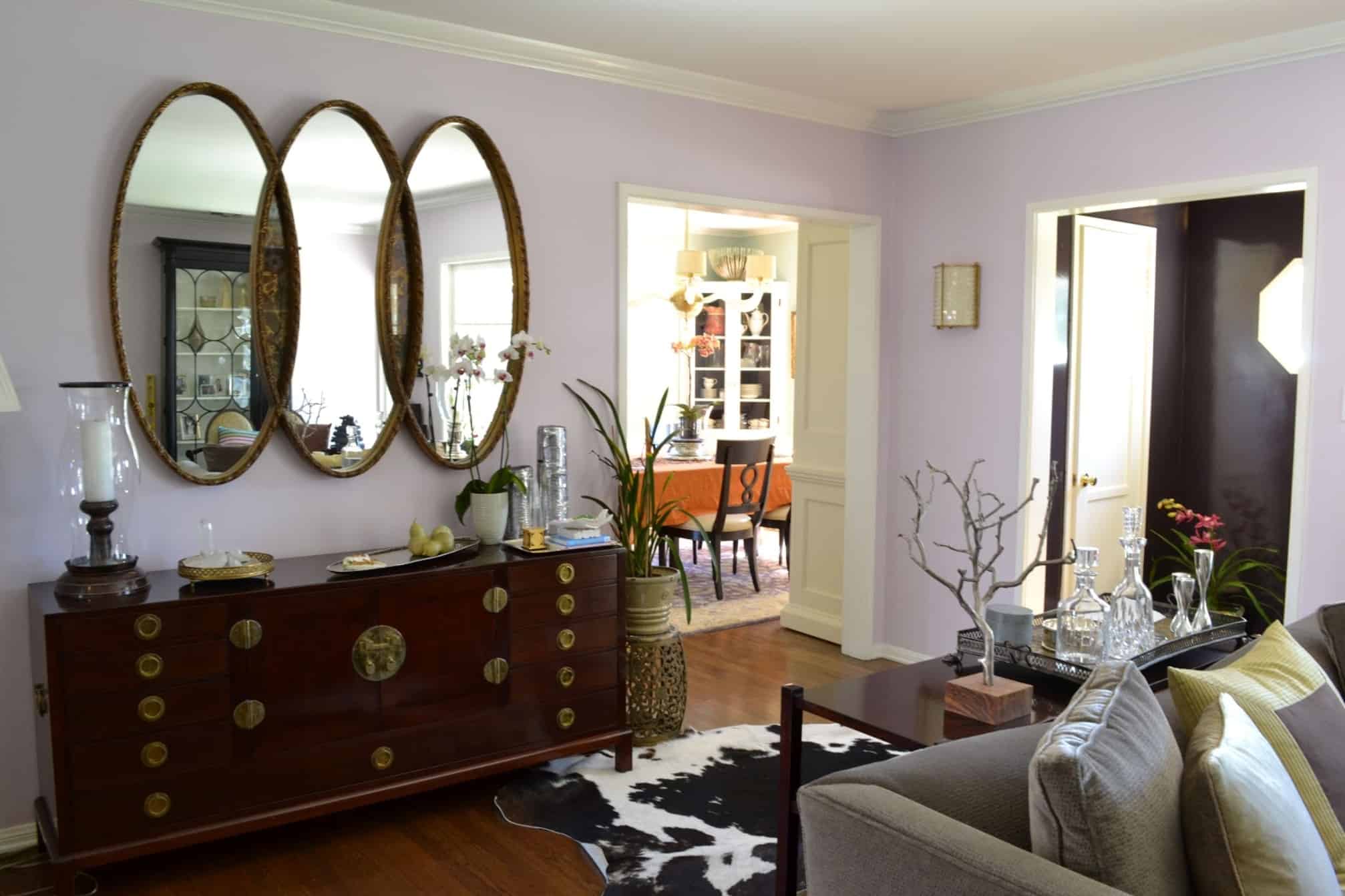 Group Triple Oval Mirrors for Reflective Interest Above a Dresser