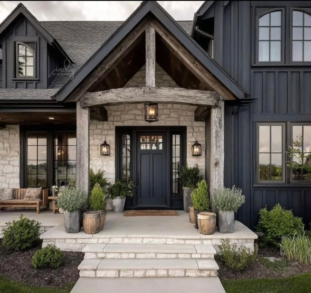 Natural Wood and Stone Planters Frame the Entry