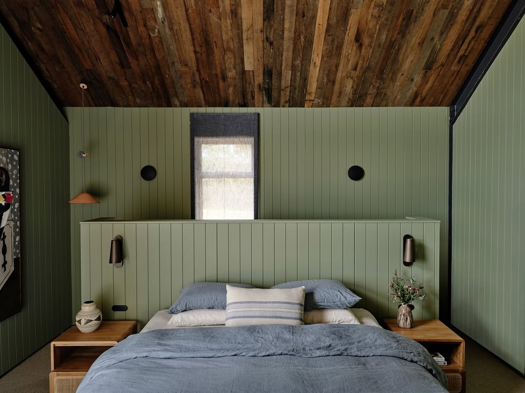 Slatted Green Headboard Creates Built-In Bedside Shelves