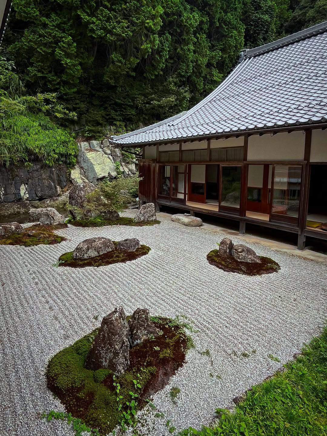 Mossy Islands With Sculpted Rocks Create Zen Garden Focal Points