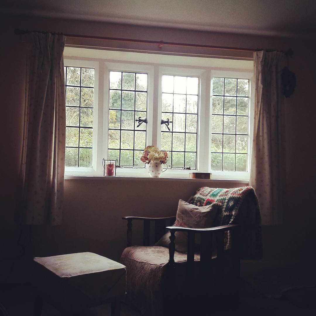 White Window Panes Frame a Garden View