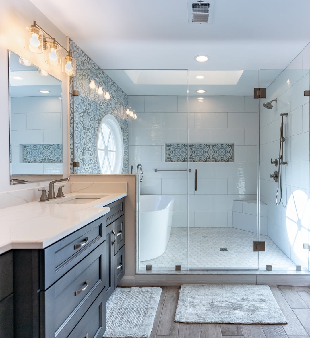 Incorporate Decorative Tile Insets to Break Up White Shower Walls