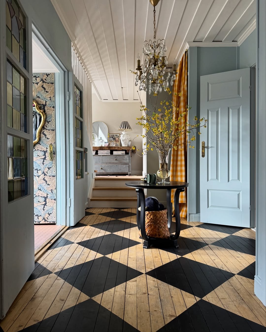 Black and Natural Wood Floor Creates Bold Geometric Pattern