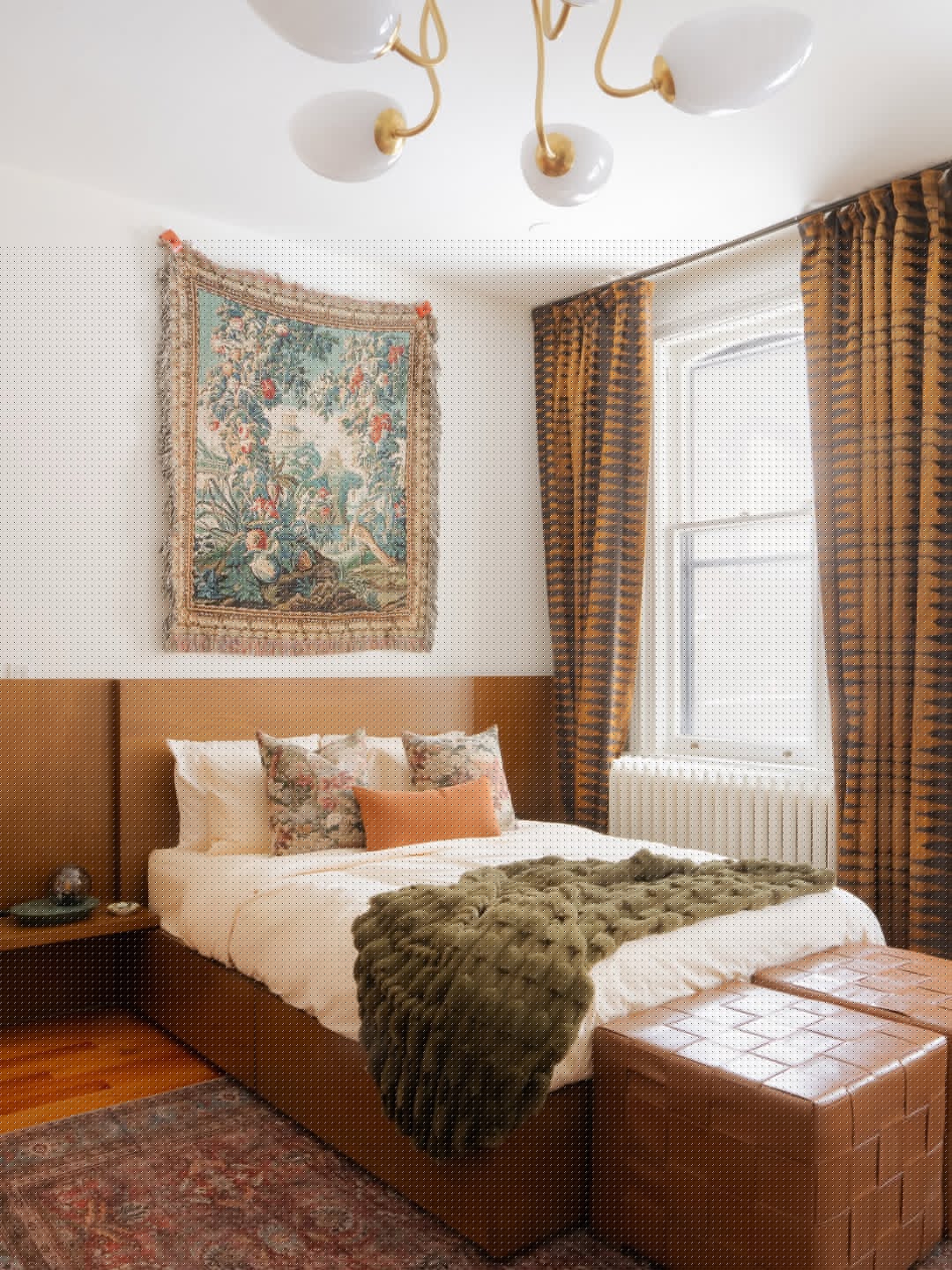 Layer Pattern and Texture With a Textile Wall Hanging Above Your Bed
