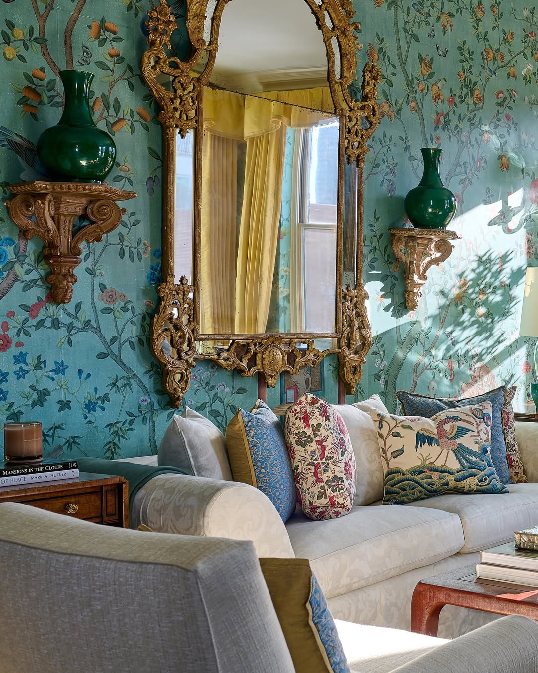 Ornate Wall Shelves Hold Emerald Green Vases