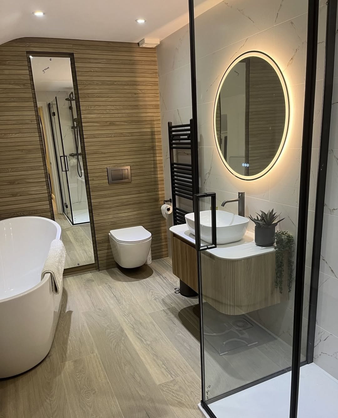 Fluted Wood Vanity Adds Organic Texture to Minimalist Design